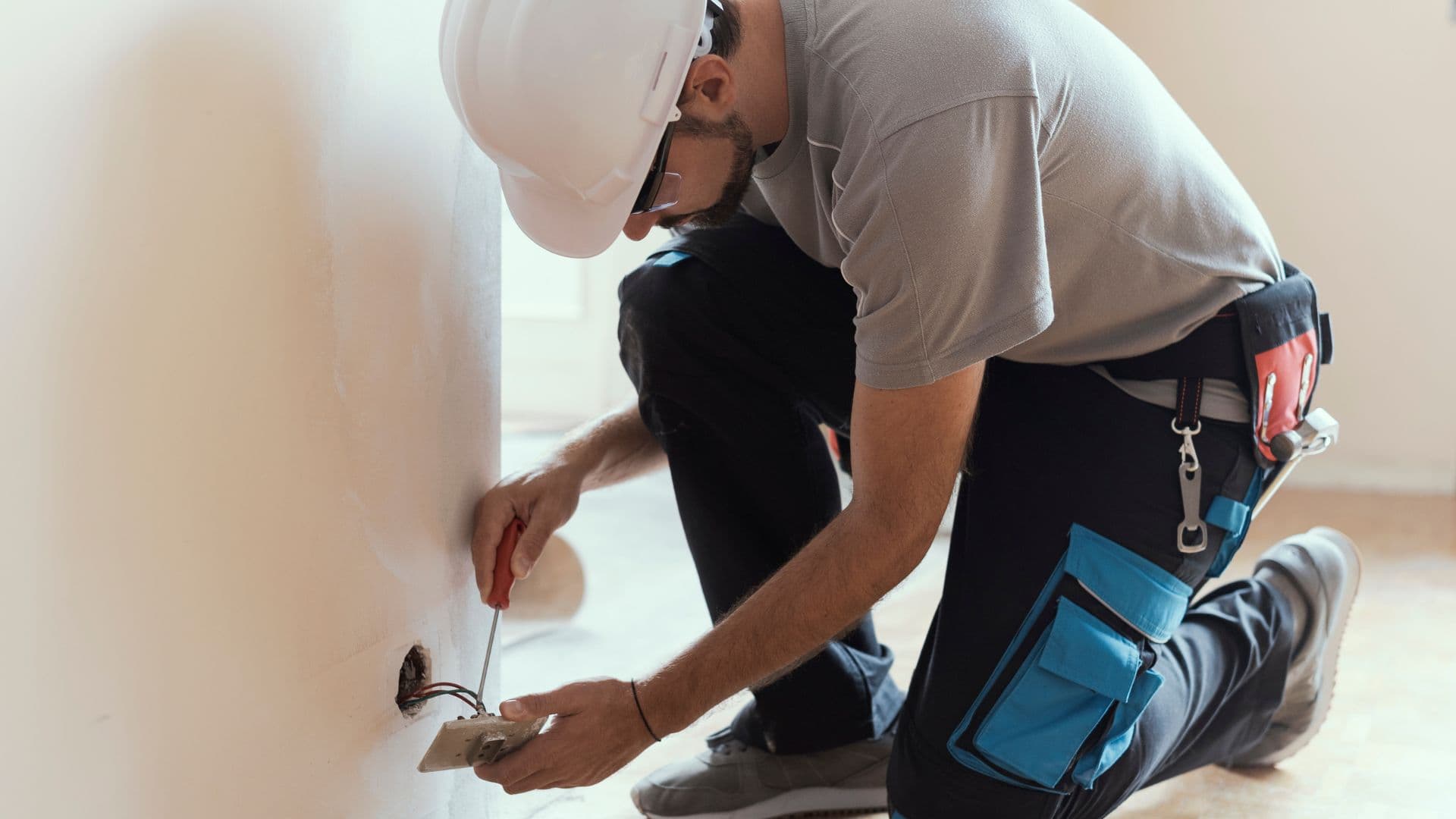 Professional electrician at work